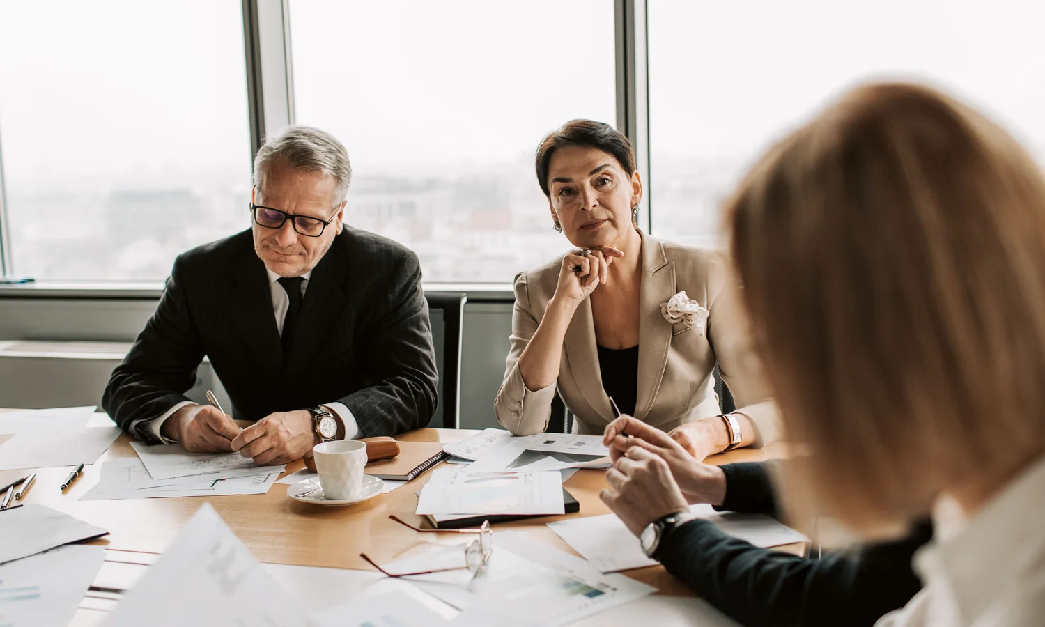 Decision-makers comparing papers and venue requirements