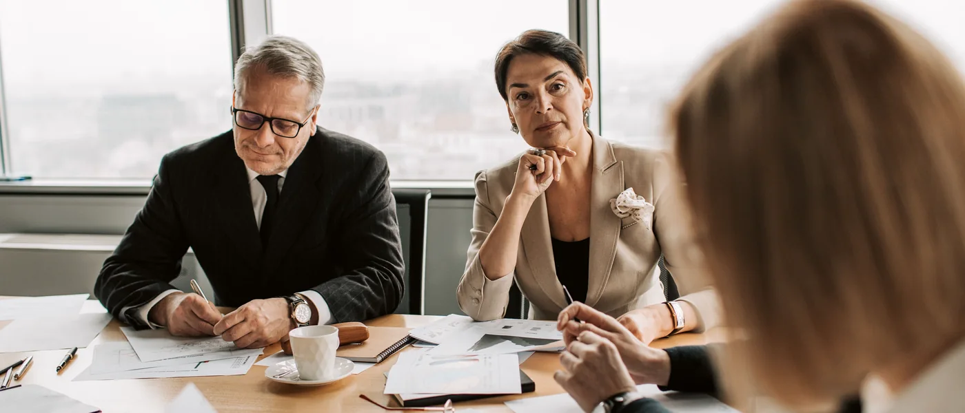 Professionals participating in a business meeting